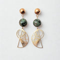 Bohemian gold-plated stainless steel drop earrings featuring round, green-speckled African Turquoise beads and geometric Golden Ratio shell charms on a white display