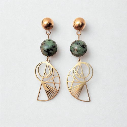 Bohemian gold-plated stainless steel drop earrings featuring round, green-speckled African Turquoise beads and geometric Golden Ratio shell charms on a white display
